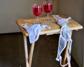 High angle view of wine glass on table