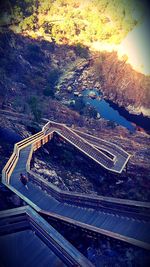 High angle view of highway on railroad tracks