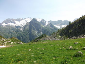 Scenic view of snowcapped mountains against sky