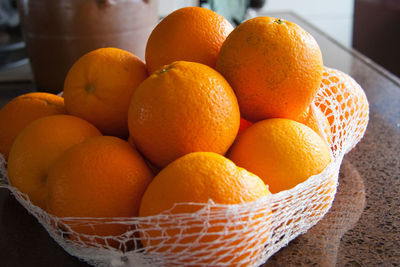 High angle view of oranges in basket