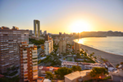 High angle shot of cityscape at sunset