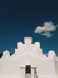 Low angle view of white building against sky