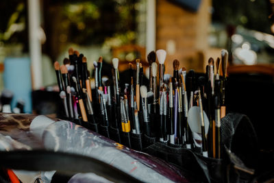 Close-up of paintbrushes on table