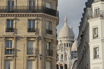 Low angle view of buildings against sky