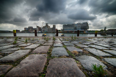 View of city against cloudy sky