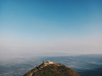 Scenic view of landscape against blue sky