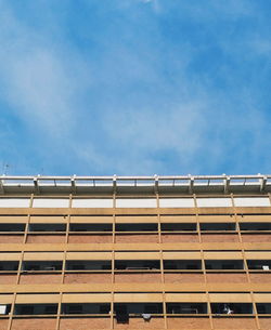 Low angle view of building against blue sky