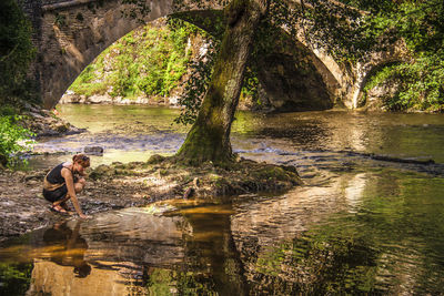 Close-up of man photographing water