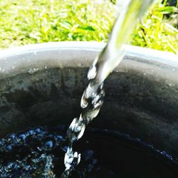 Close-up of water drops on metal