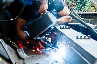 Man working on metal