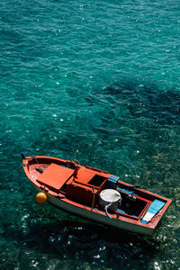 High angle view of ship moored in sea