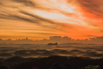 Scenic view of silhouette landscape against sky during sunset