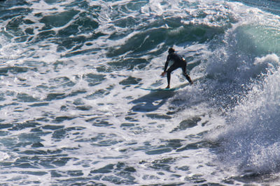 Man surfing in sea