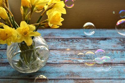 Close-up of flowers in vase on table