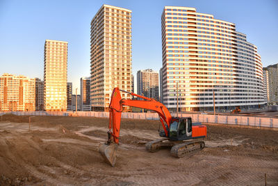 Digging the pit foundation a hole with excavator. earthwork in excavation and backfilling of soil 