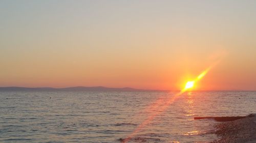 Scenic view of sunset over sea