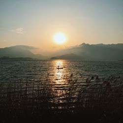 Scenic view of sea at sunset