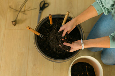 Cropped hand of man gardening