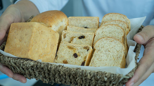 Close-up of hand holding bread