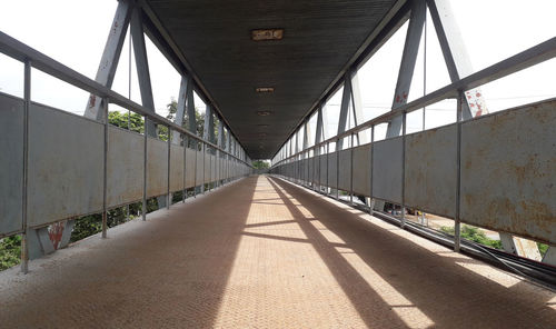View of footbridge along road