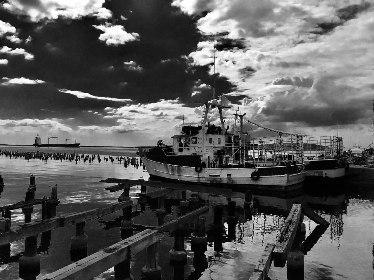 water, sky, reflection, nautical vessel, mode of transport, moored, cloud - sky, transportation, river, harbor, outdoors, day, no people, nature, bridge - man made structure, architecture, dock, yacht