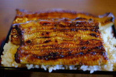 High angle view of meat on barbecue grill