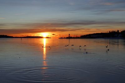 Scenic view of sea against sky during sunset