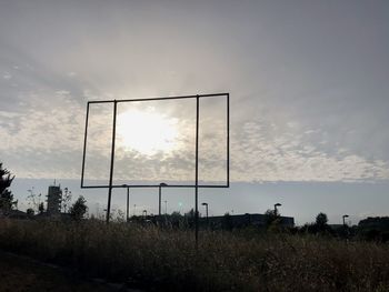 Scenic view of field against sky during sunset