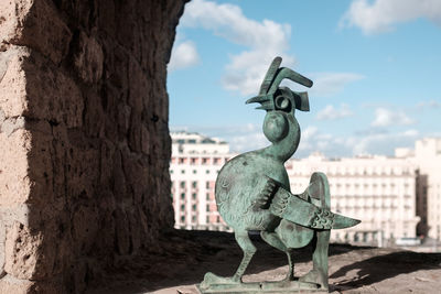 Close-up of statue against sky