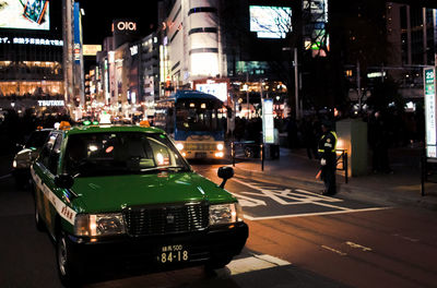 Traffic on city street at night