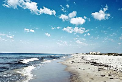 Scenic view of beach against sky