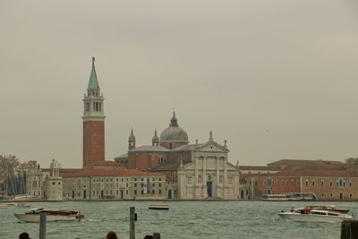 Church of san giorgio maggiore by grand canal against sky in city