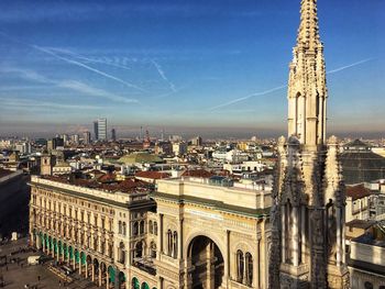 Panoramic view of buildings in city against sky