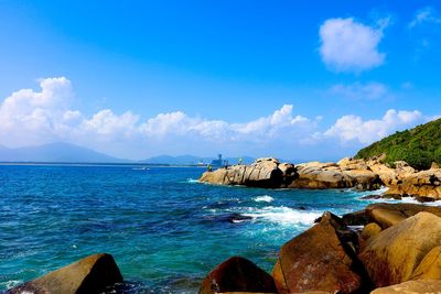 Scenic view of sea against cloudy sky