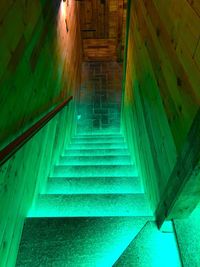 Low angle view of steps in illuminated building