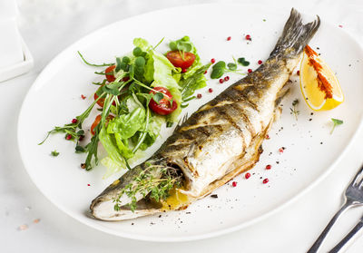 High angle view of fish served in plate