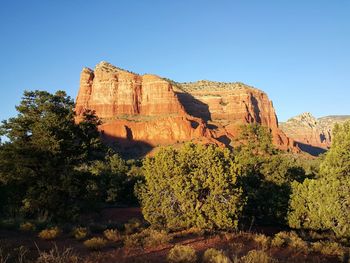 Low angle view of castle against clear blue sky