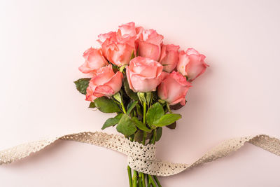 Close-up of rose bouquet against white background