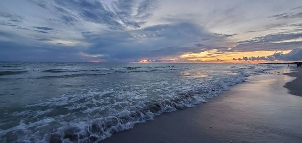 Scenic view of sea against sky during sunset