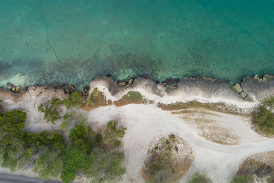 High angle view of sea shore against sky