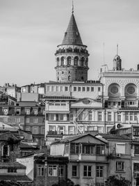 Low angle view of buildings in city against sky