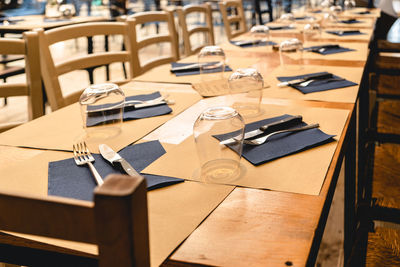 High angle view of chairs at table