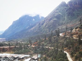 Scenic view of mountains against sky during winter