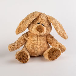 Close-up of stuffed toy against white background