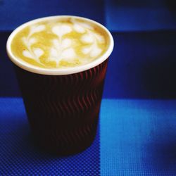Close-up of cappuccino on table