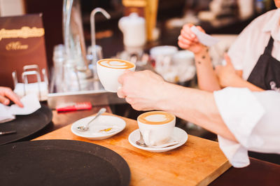 Close-up of coffee cup on table