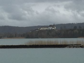 View of landscape against cloudy sky