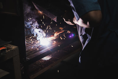 Man working on metal