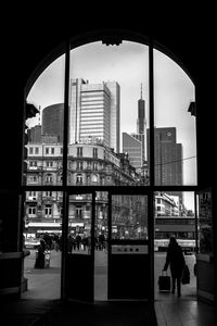 Silhouette of woman in city