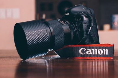 Close-up of camera on table